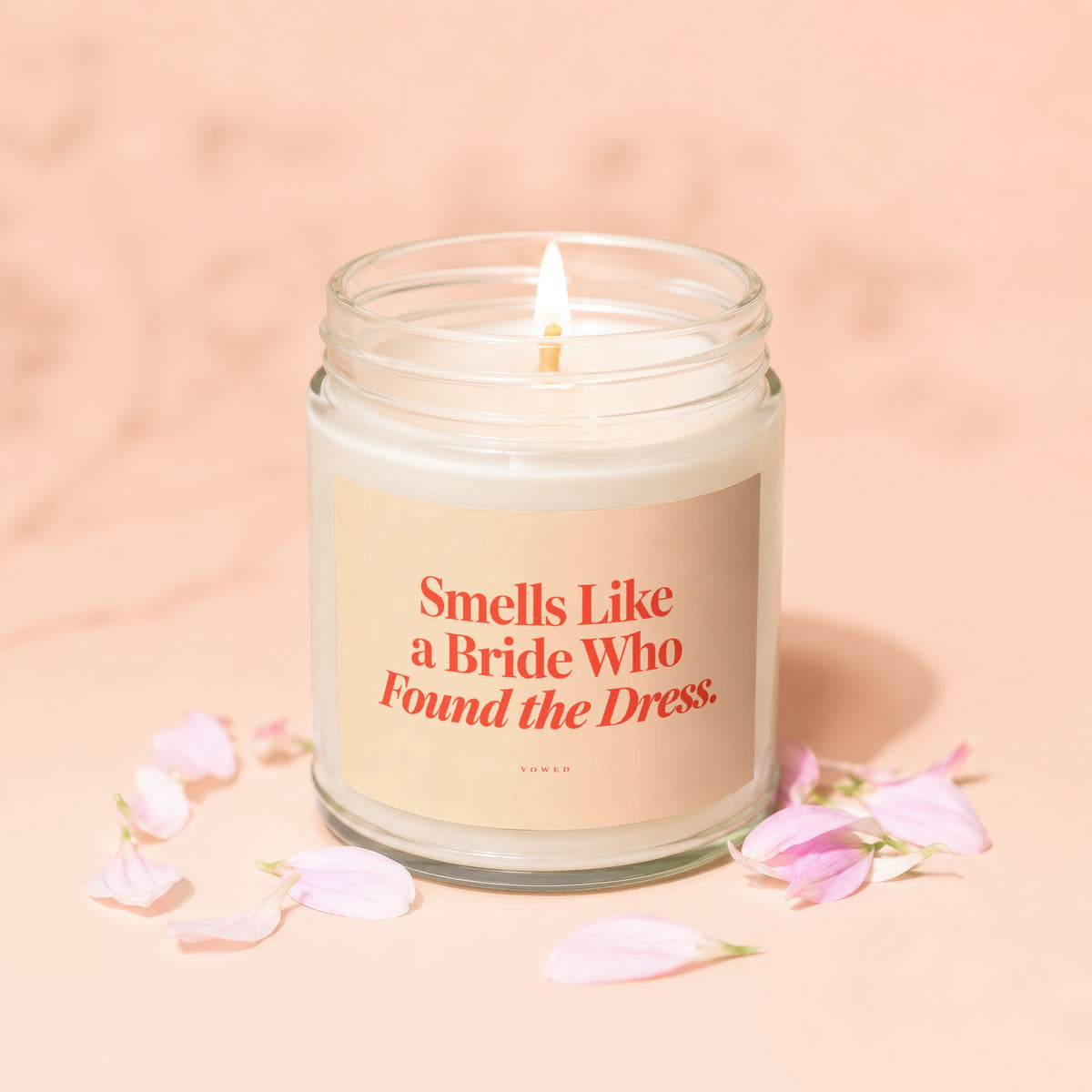 Candle with text "Smells Like a Bride Who Found the Dress."