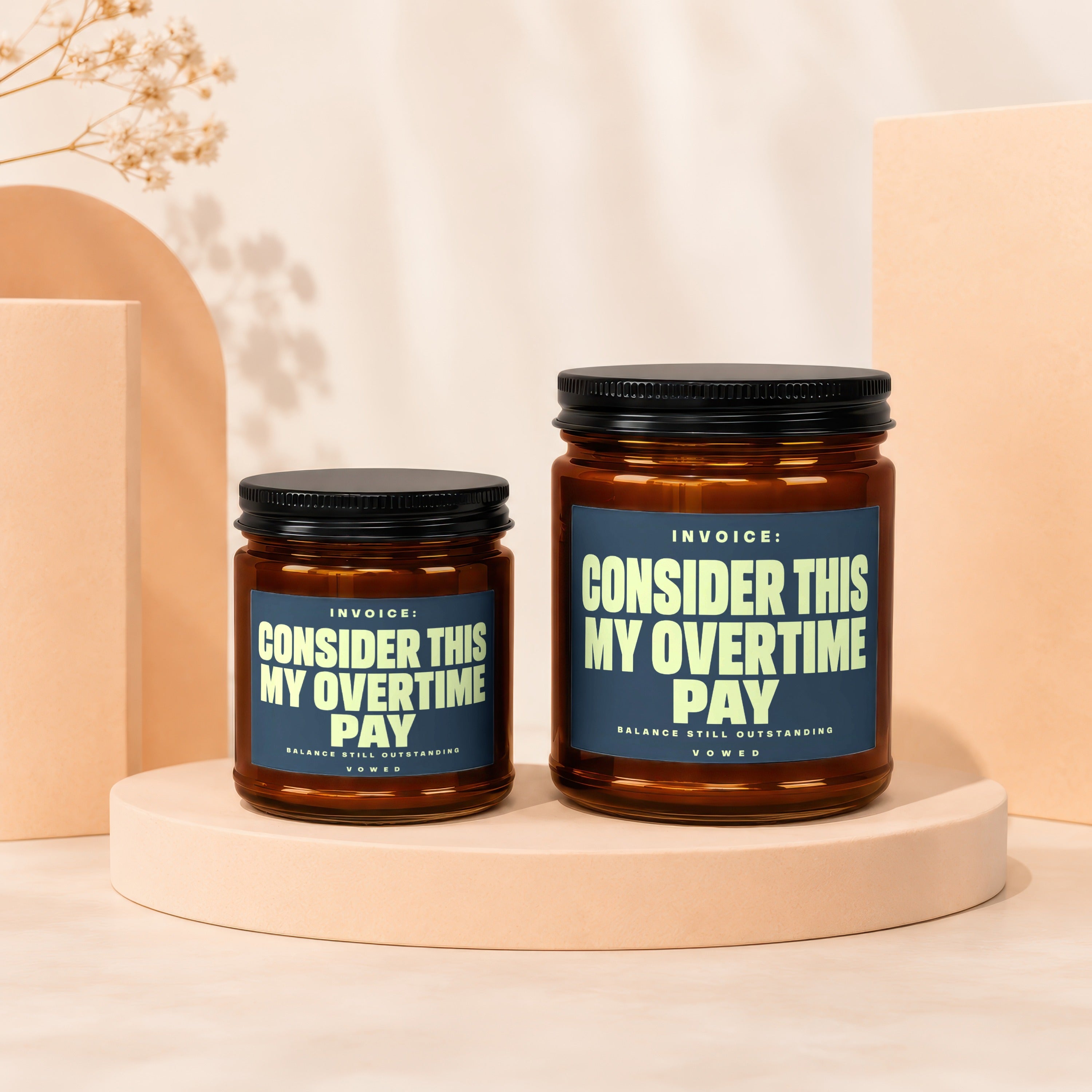 Two amber glass jars with black lids, each labeled "Consider This My Overtime Pay".