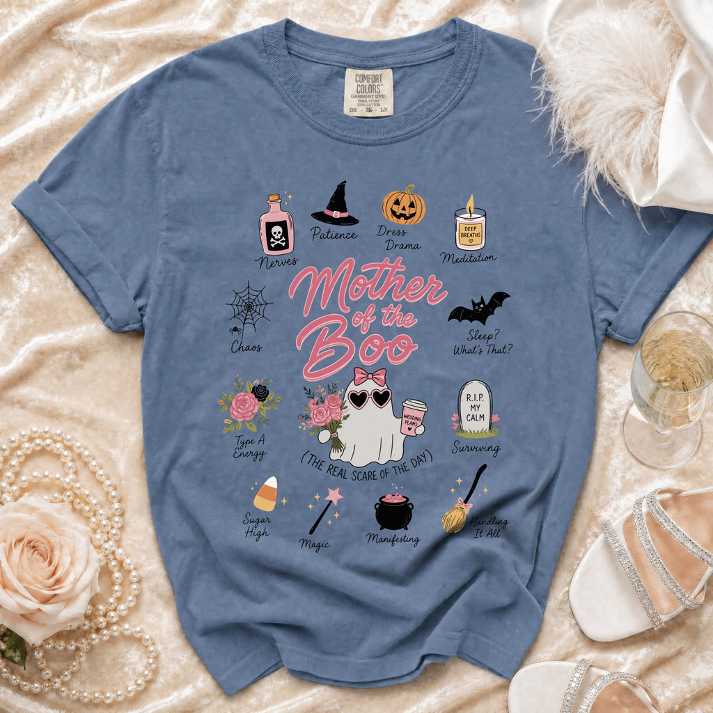 Blue Comfort Colors t-shirt with "Mother of the Boo" graphic and Halloween-themed illustrations.