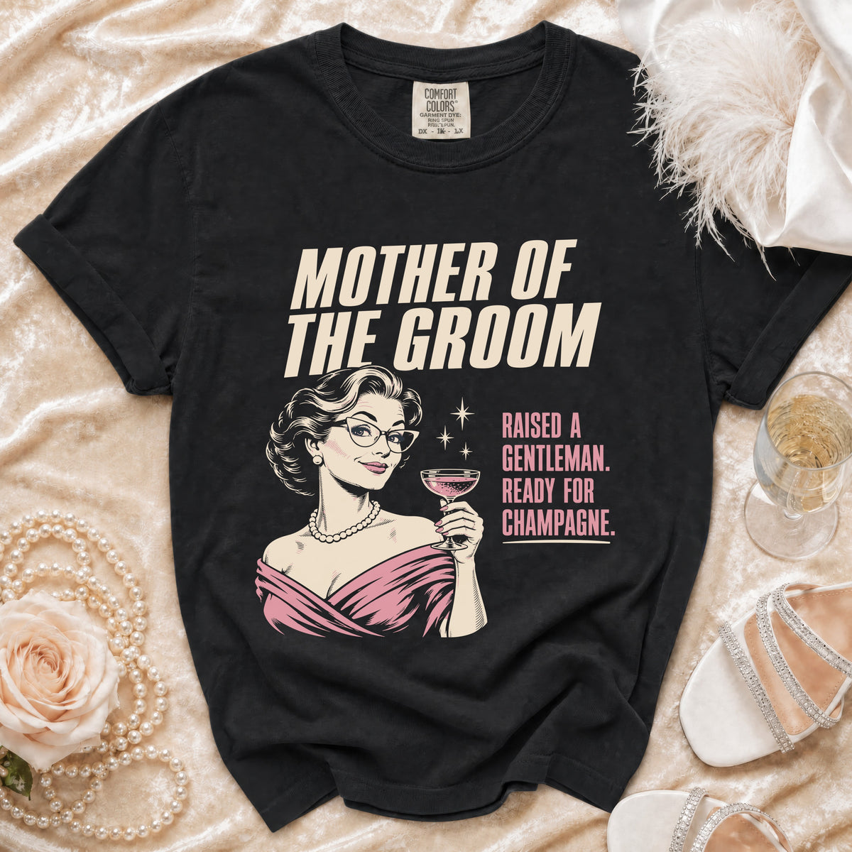 Black t-shirt with "Mother of the Groom" and a woman holding champagne.