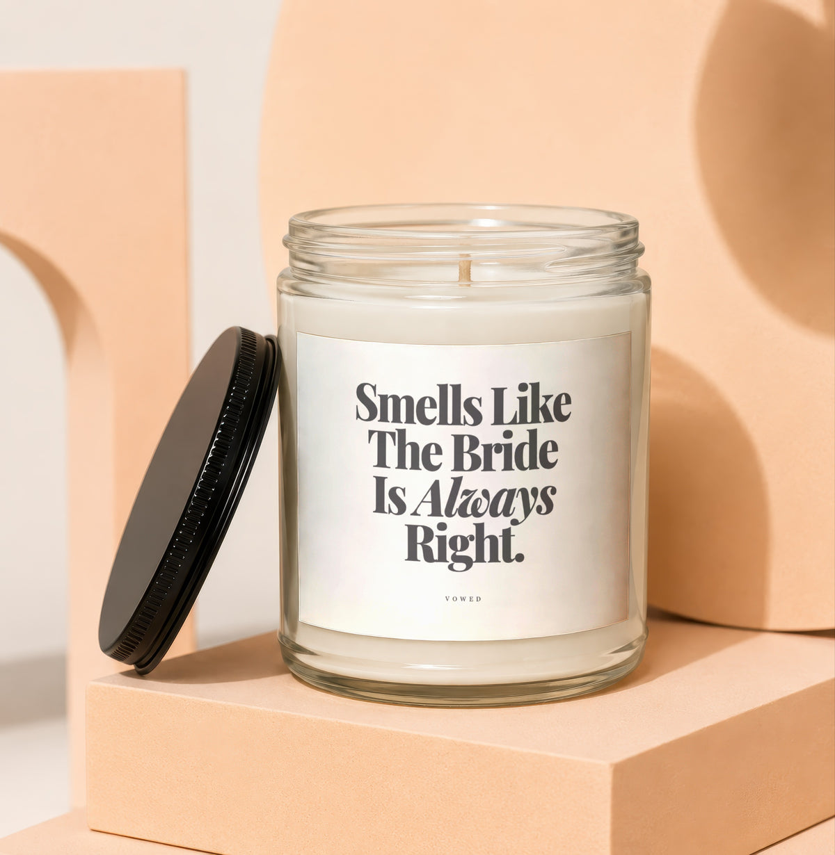 Candle with text "Smells Like The Bride Is Always Right." VOWED.