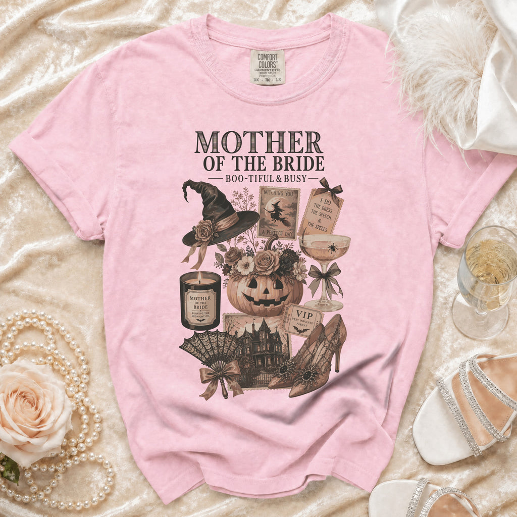 Pink t-shirt with "Mother of the Bride" text and Halloween-themed graphics.