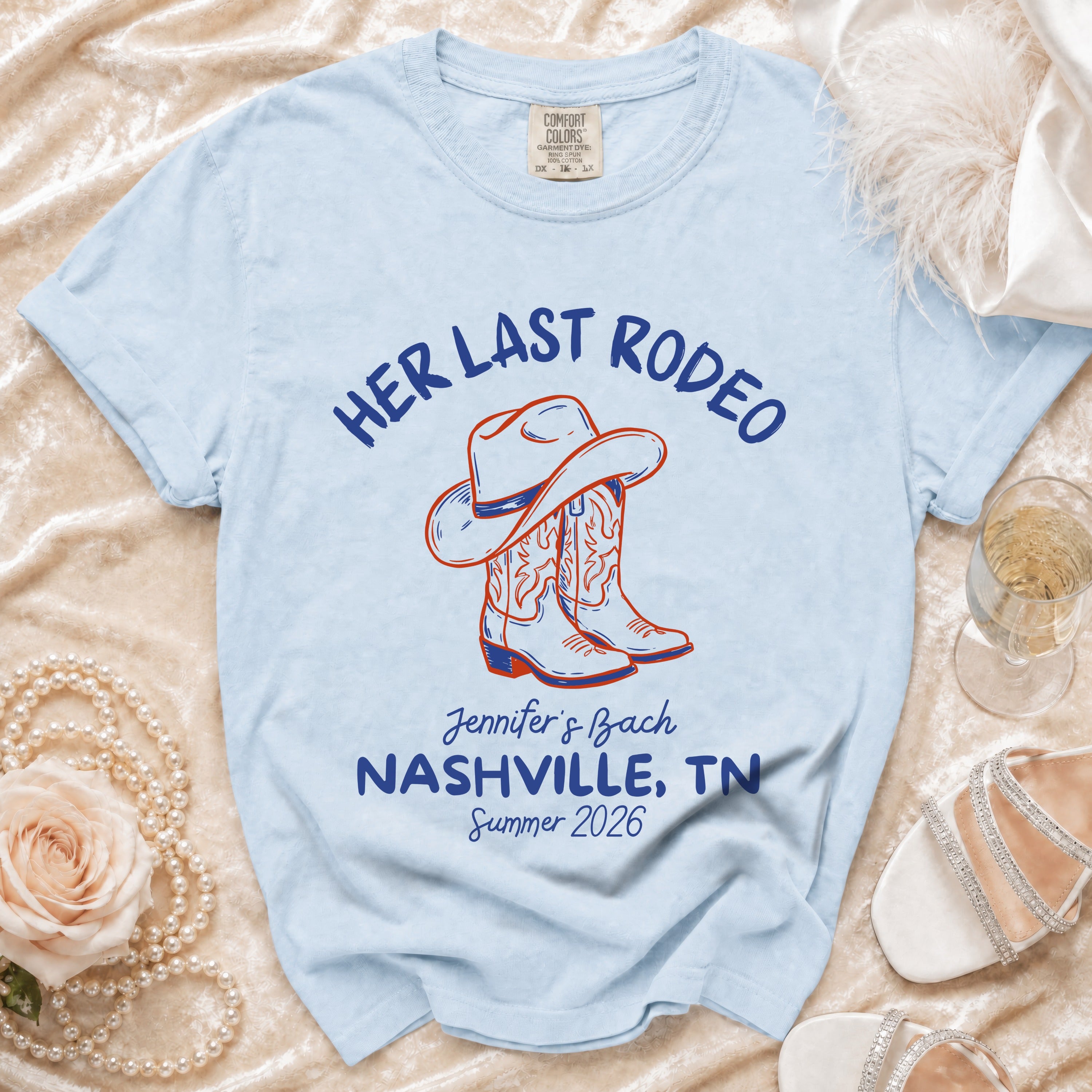 Light blue t-shirt with "Her Last Rodeo" graphic and Nashville bachelorette details.