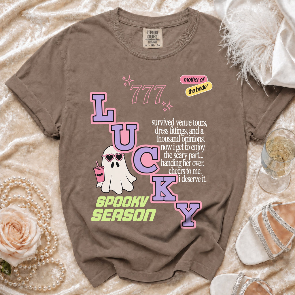 Brown t-shirt with "Lucky" text, ghost, and "Spooky Season" graphic.