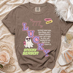 Brown t-shirt with "Lucky" text, ghost, and "Spooky Season" graphic.
