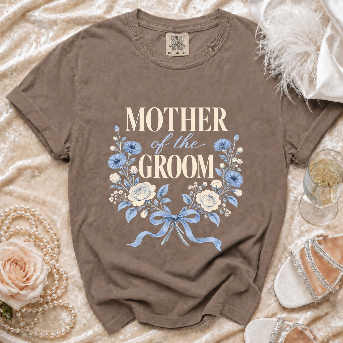 Brown t-shirt with "Mother of the Groom" text and floral design.
