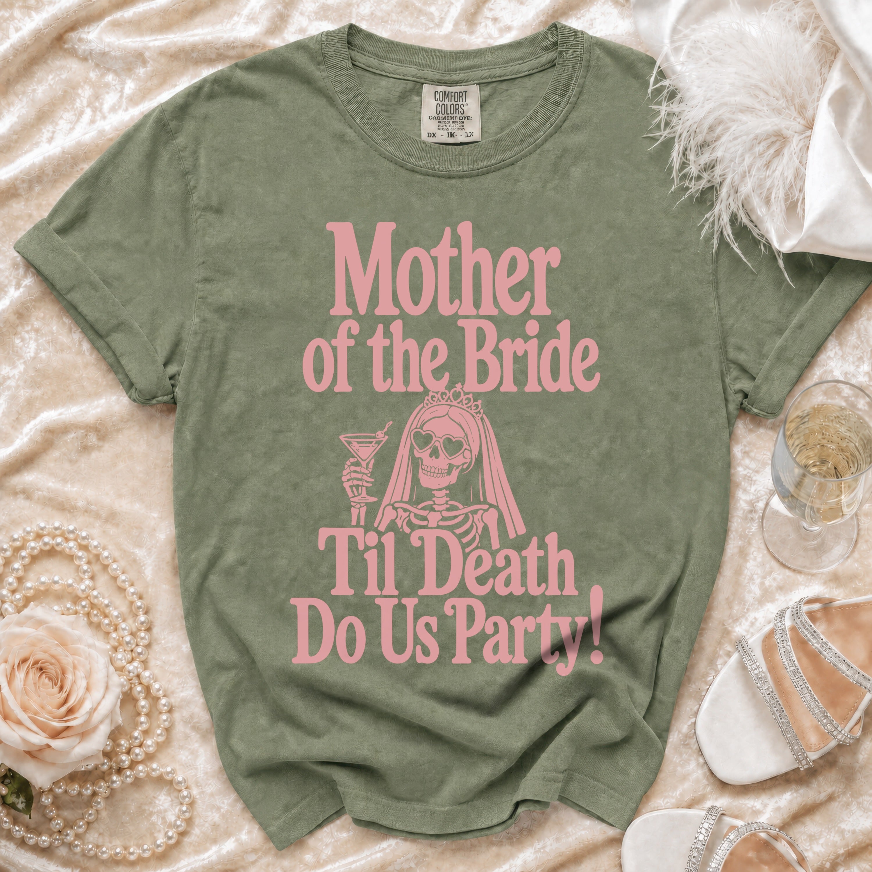 Green t-shirt with pink "Mother of the Bride 'Til Death Do Us Party!" text and skeleton graphic.