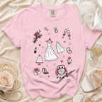 Pink t-shirt with wedding icons: dress, cake, rings, and "Just Married" car.