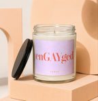 Glass candle with a black lid, showing "enGAYged" and "VOWED" on the label.