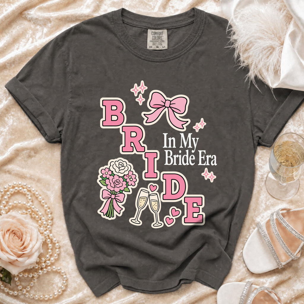 Dark grey t-shirt with "BRIDE" and "In My Bride Era" text and graphics.