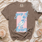 Brown t-shirt with a goose holding flowers and text "goose of honor".