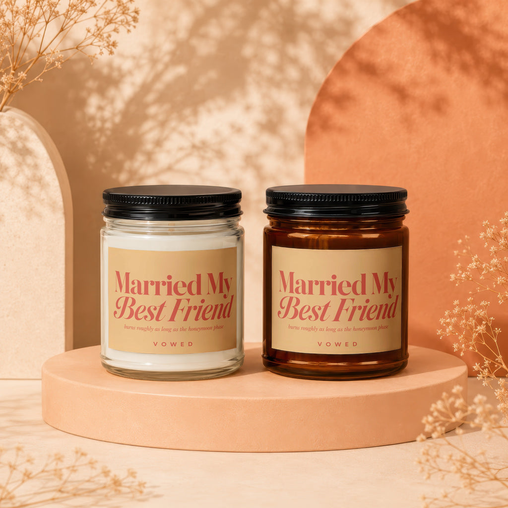 Two candles labeled "Married My Best Friend" by VOWED.