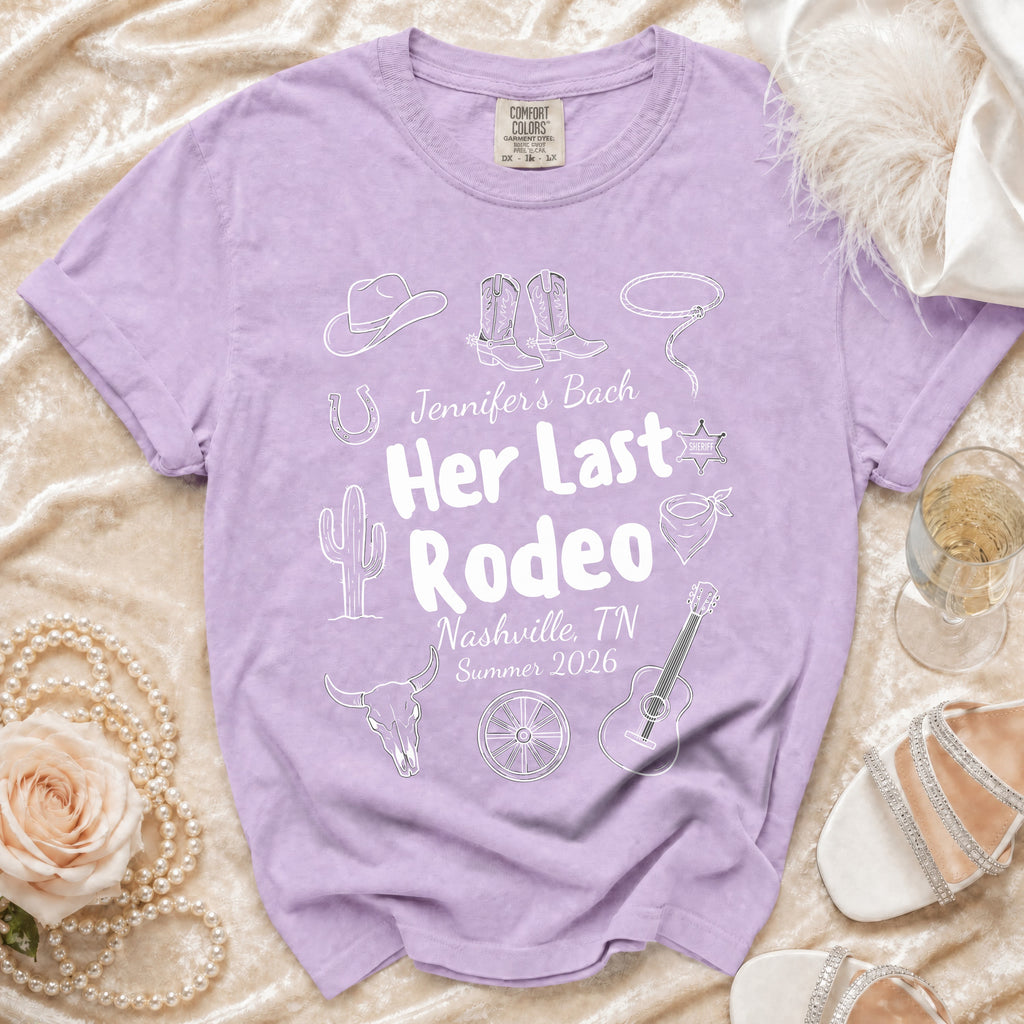Purple t-shirt with "Jennifer's Bach Her Last Rodeo Nashville, TN Summer 2026" and rodeo graphics.