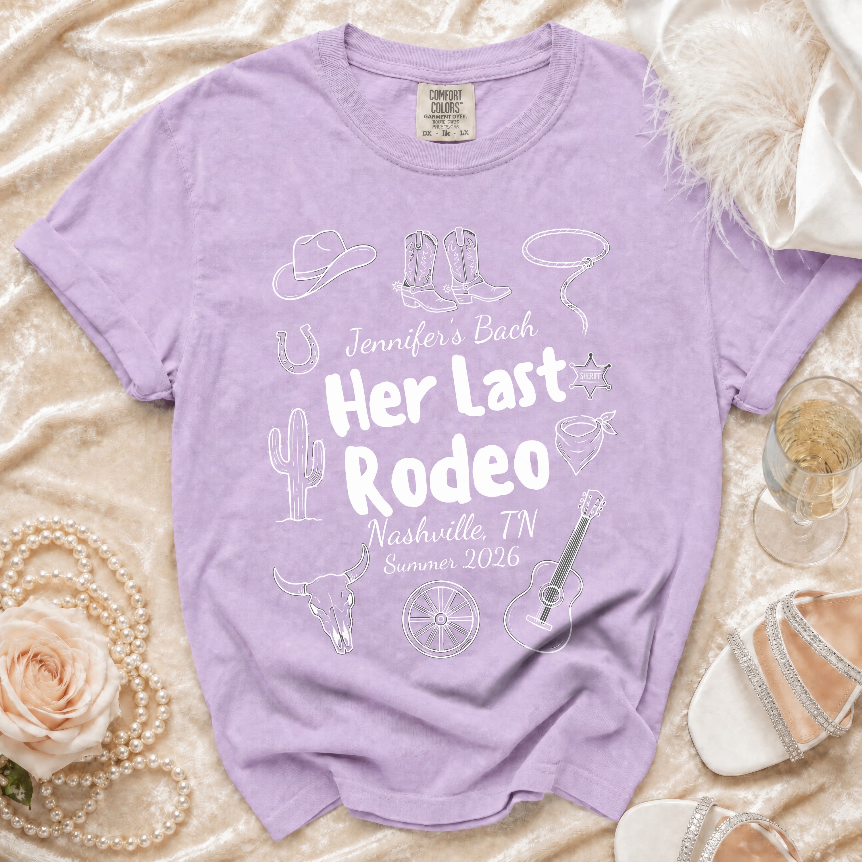 Purple t-shirt with "Jennifer's Bach Her Last Rodeo Nashville, TN Summer 2026" and rodeo graphics.