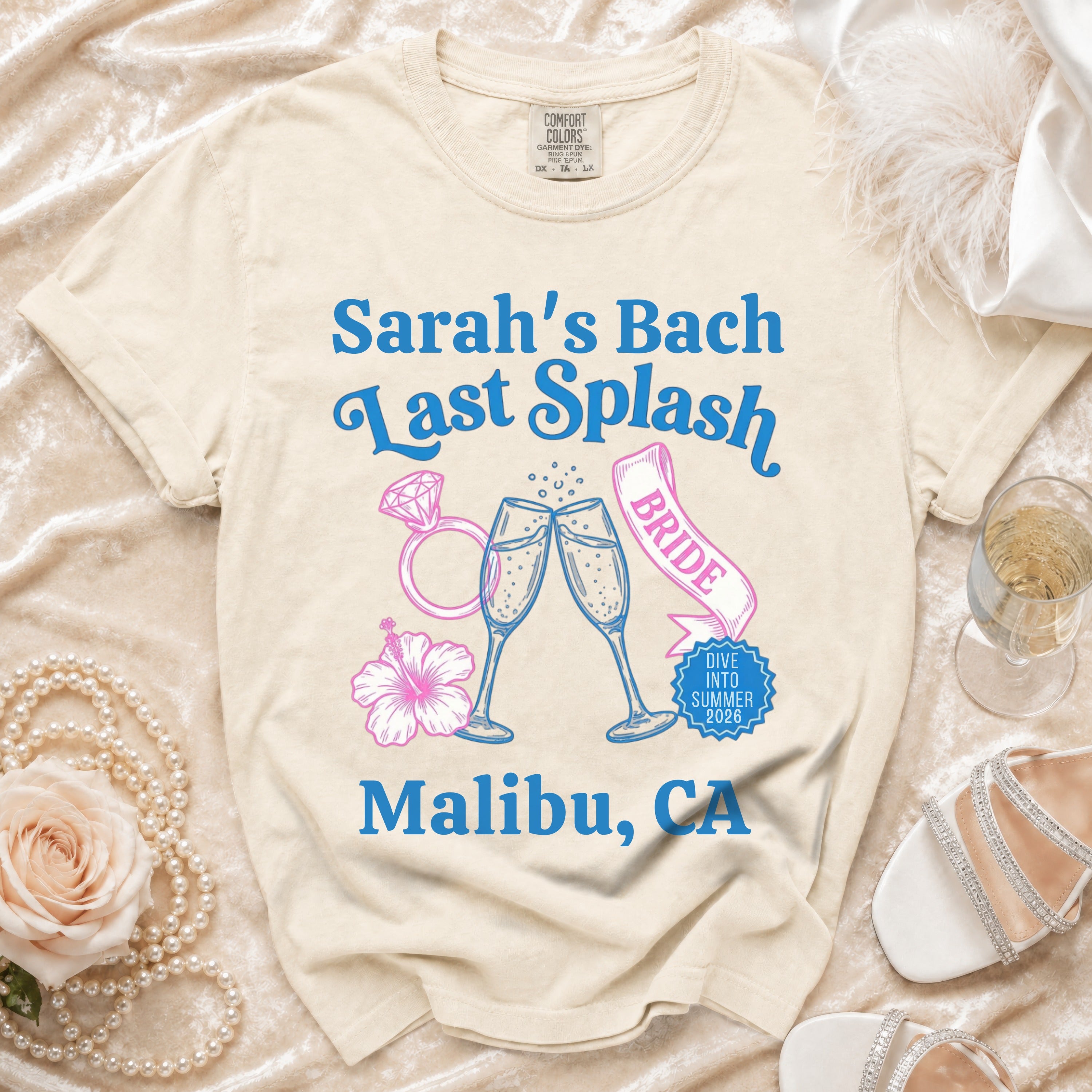 Cream t-shirt with "Sarah's Bach Last Splash" text, champagne glasses, and "Malibu, CA".