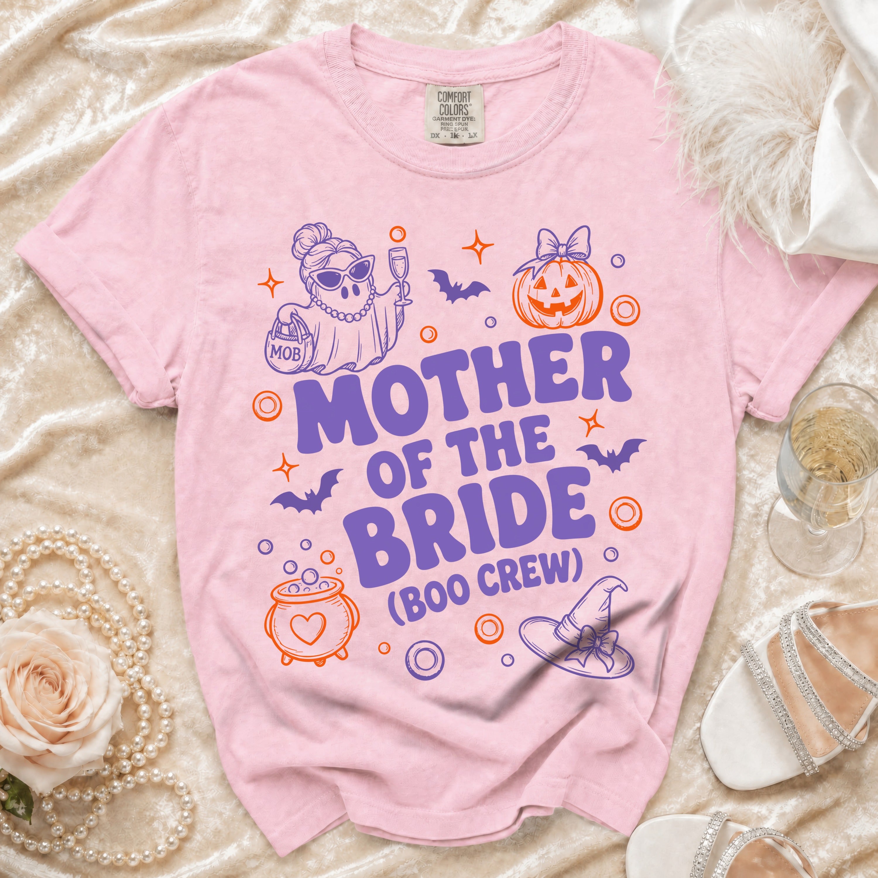 Pink t-shirt with "Mother of the Bride (Boo Crew)" and Halloween graphics.