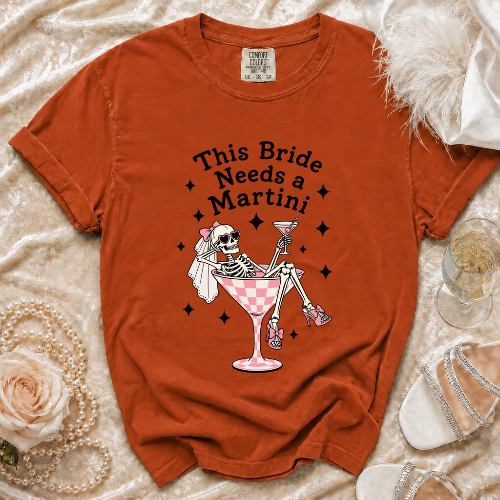 Orange t-shirt with text "This Bride Needs a Martini" and skeleton graphic.