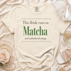 Cream t-shirt with "This Bride runs on Matcha and unbothered energy" text.