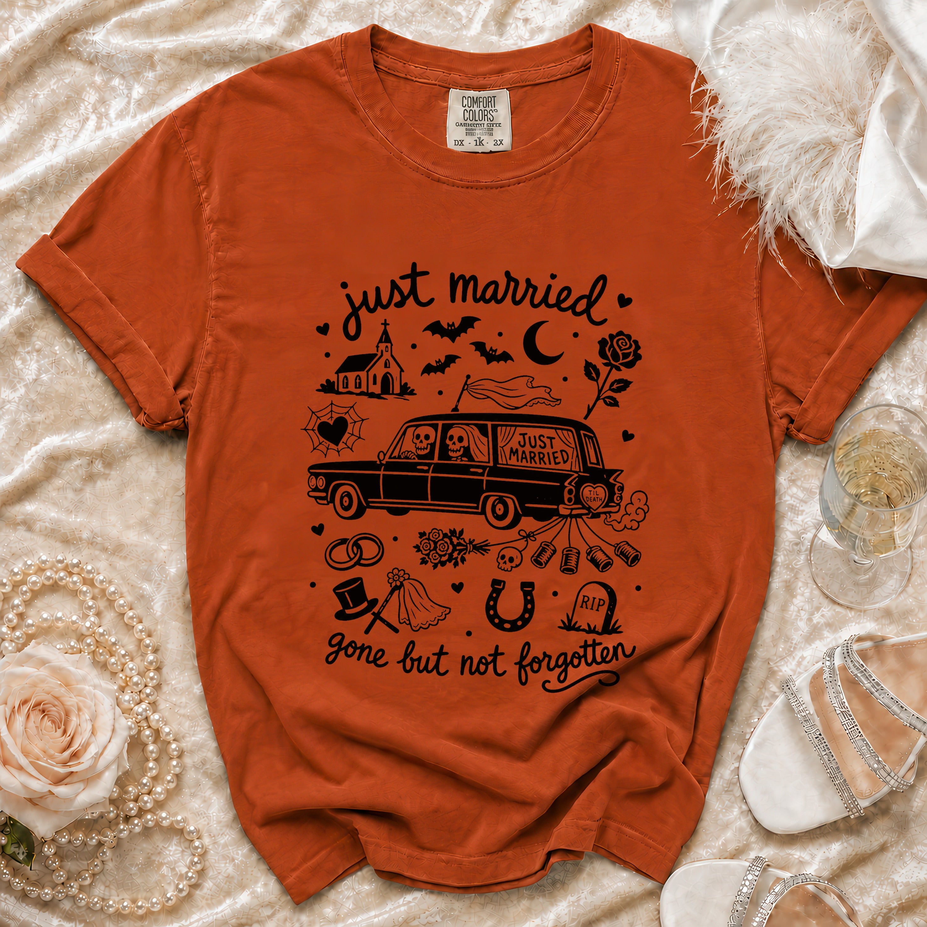 Orange t-shirt with "just married" and "gone but not forgotten" gothic wedding print.