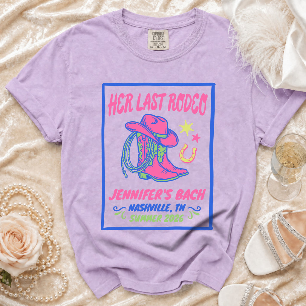 Purple t-shirt with "Her Last Rodeo Jennifer's Bach" text, cowboy boots, and star.