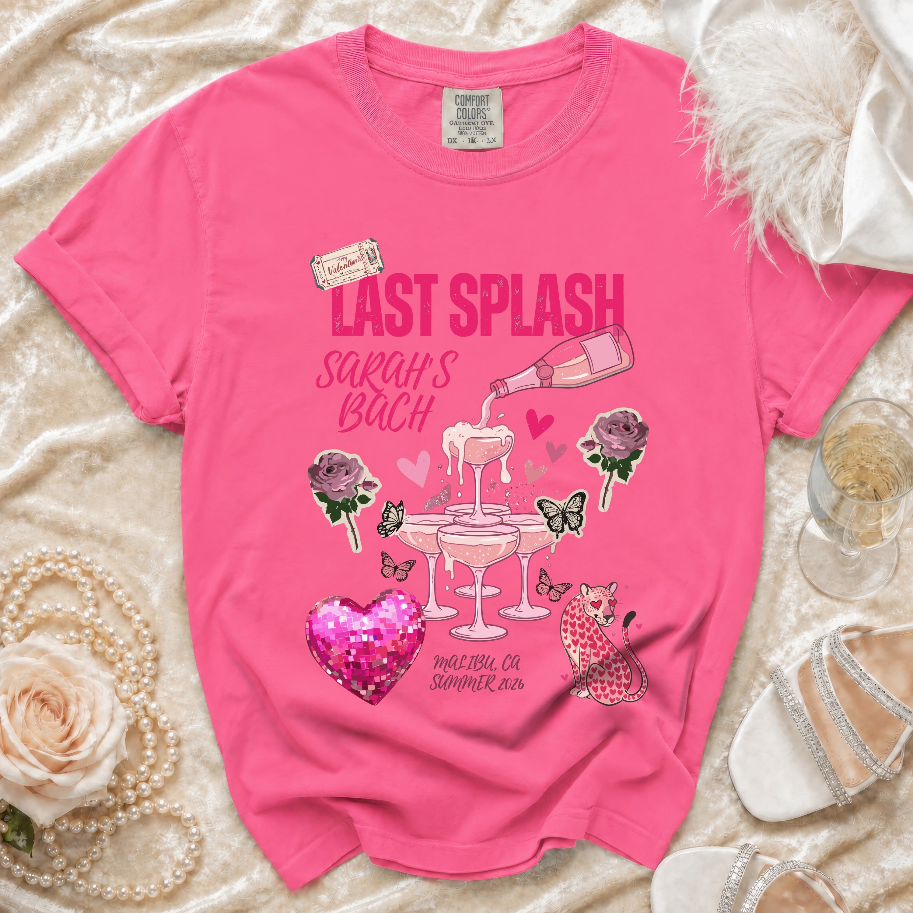 Pink t-shirt with "Last Splash Sarah's Bach Malibu, CA Summer 2026" design.
