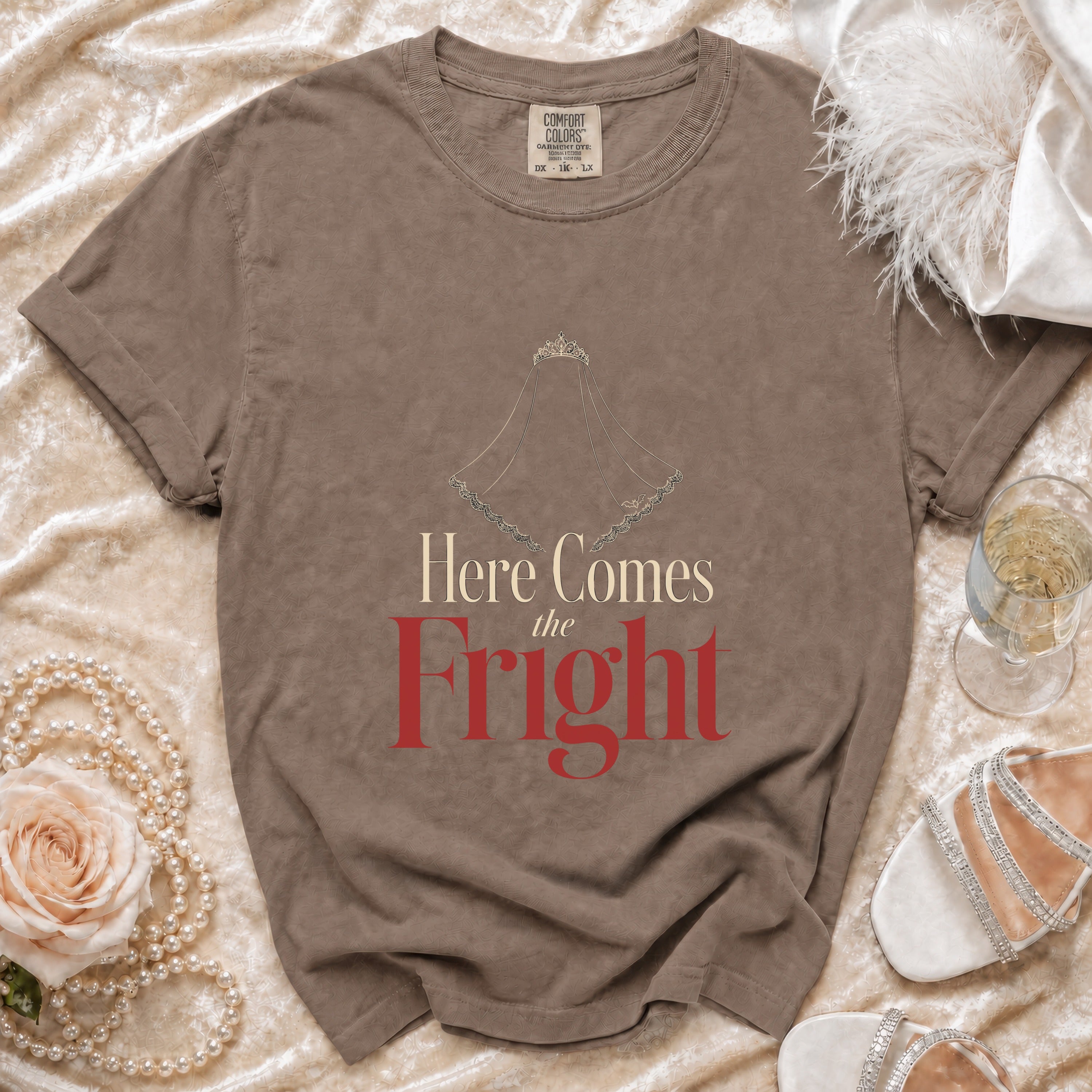 Brown t-shirt with "Here Comes the Fright" text and a veil graphic.