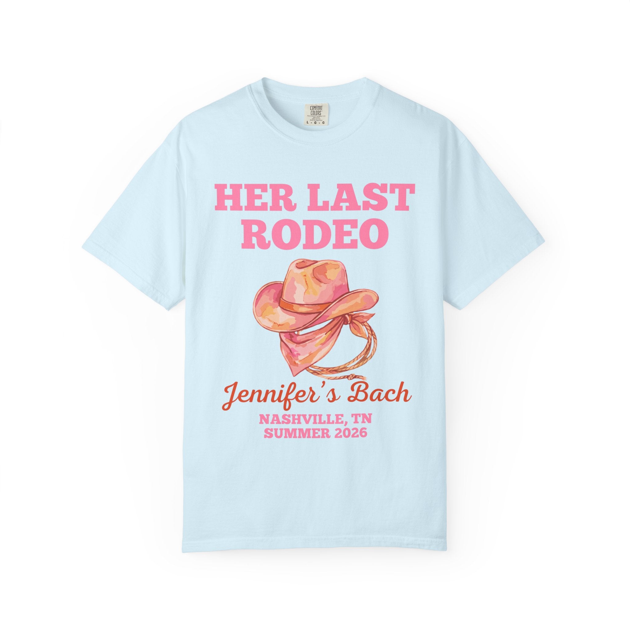 Light blue t-shirt with pink text "Her Last Rodeo" and a cowboy hat.