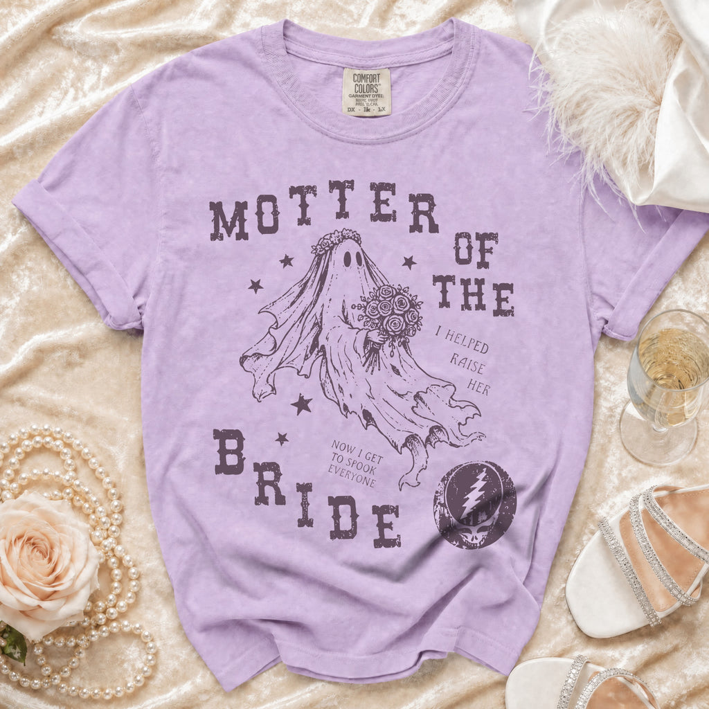 Purple t-shirt with "Mother of the Bride" graphic of a ghost bride holding flowers.