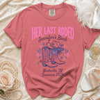 Pink t-shirt with "Her Last Rodeo" and cowboy boots graphic.