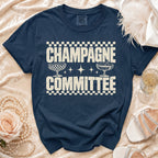 Navy t-shirt with distressed text "CHAMPAGNE COMMITTEE" and champagne glasses.
