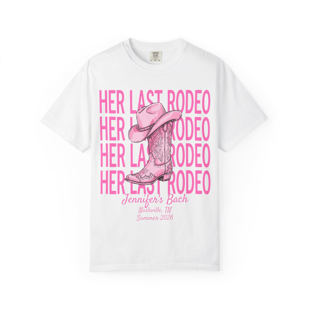 White t-shirt with "Her Last Rodeo" text and pink cowboy boot graphic.