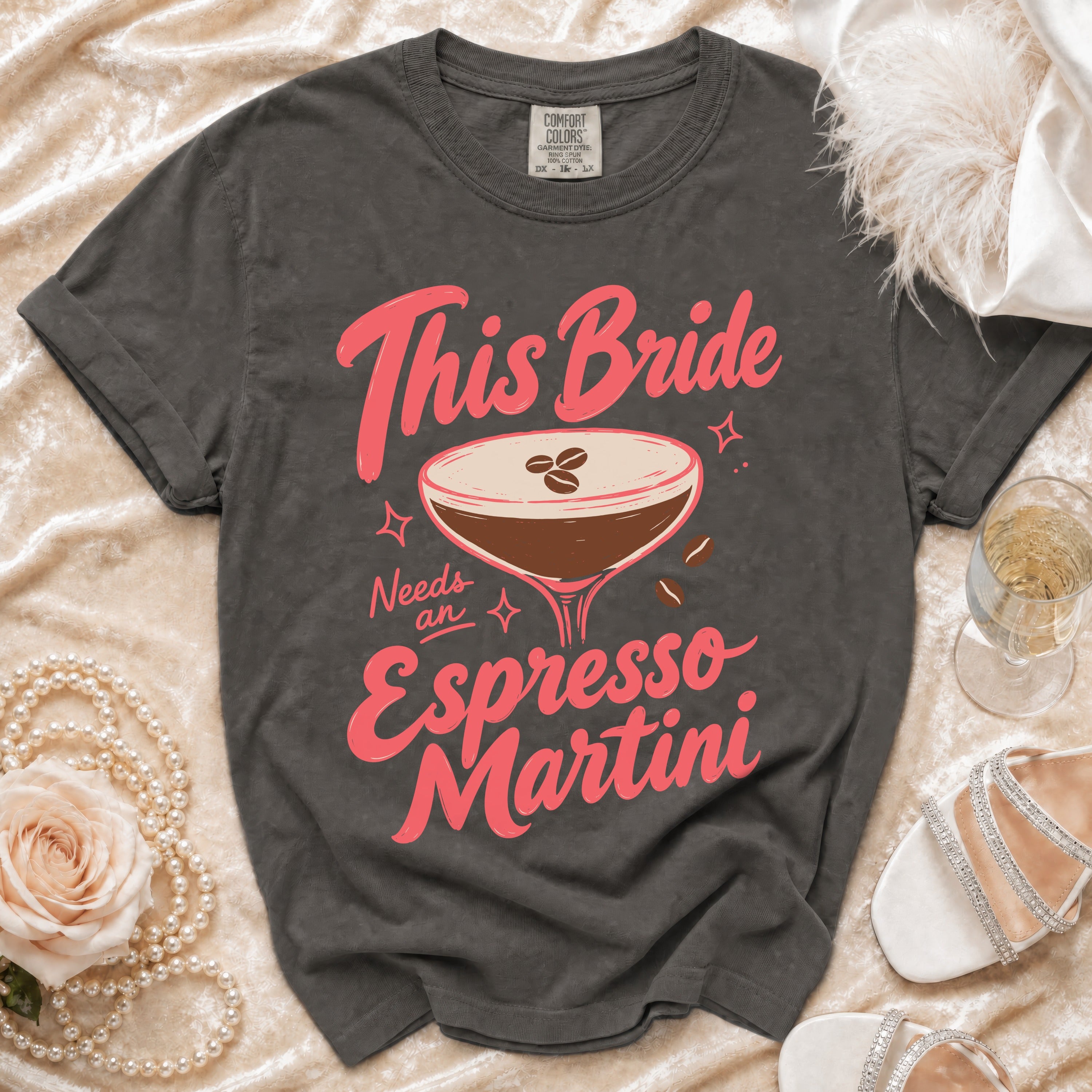 Dark grey t-shirt with "This Bride Needs an Espresso Martini" text and graphic.