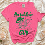 Pink t-shirt with "Her Last Rodeo" cowboy boots and hat graphic.