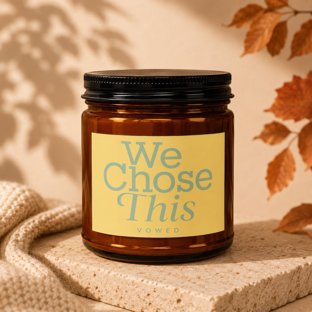 Amber candle with "We Chose This vowed" text on a yellow label.