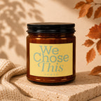 Amber candle with "We Chose This vowed" text on a yellow label.