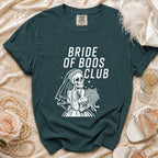 Dark green t-shirt with white "BRIDE OF BOOS CLUB" text and skeleton bride graphic.