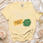 Yellow t-shirt with "Her Last Bash" and cowboy boots graphic.