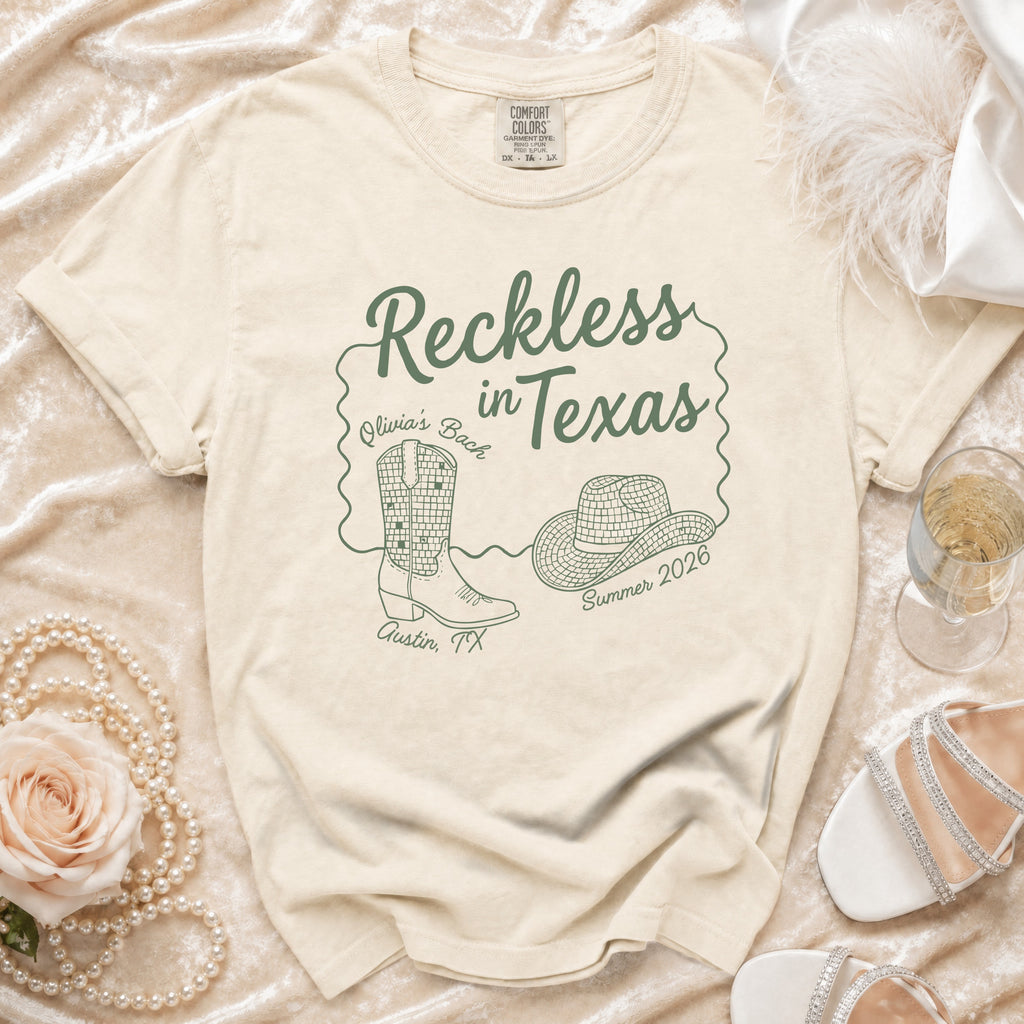 Comfort Colors t-shirt with "Reckless in Texas" design for Olivia's Bach.