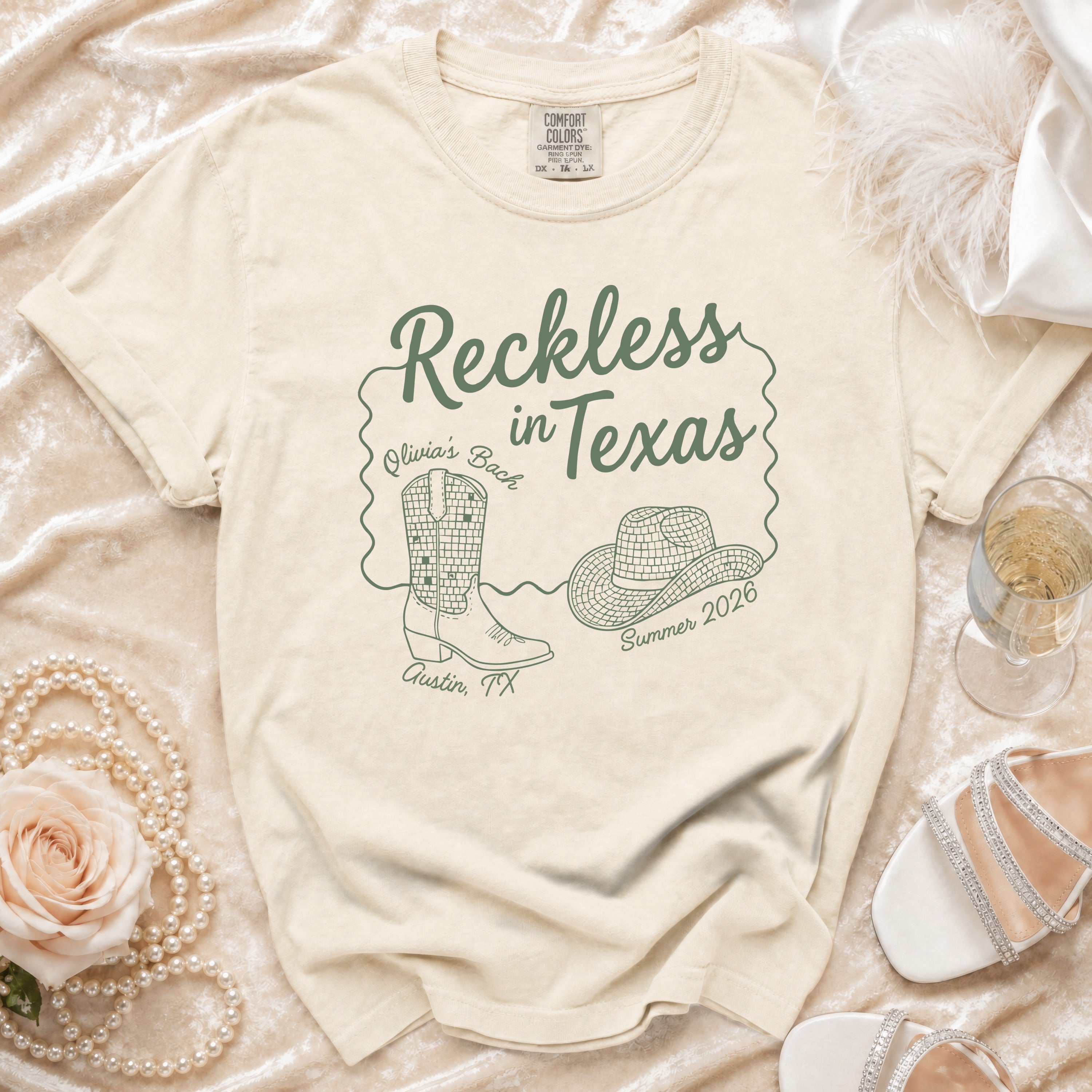 Comfort Colors t-shirt with "Reckless in Texas" design for Olivia's Bach.
