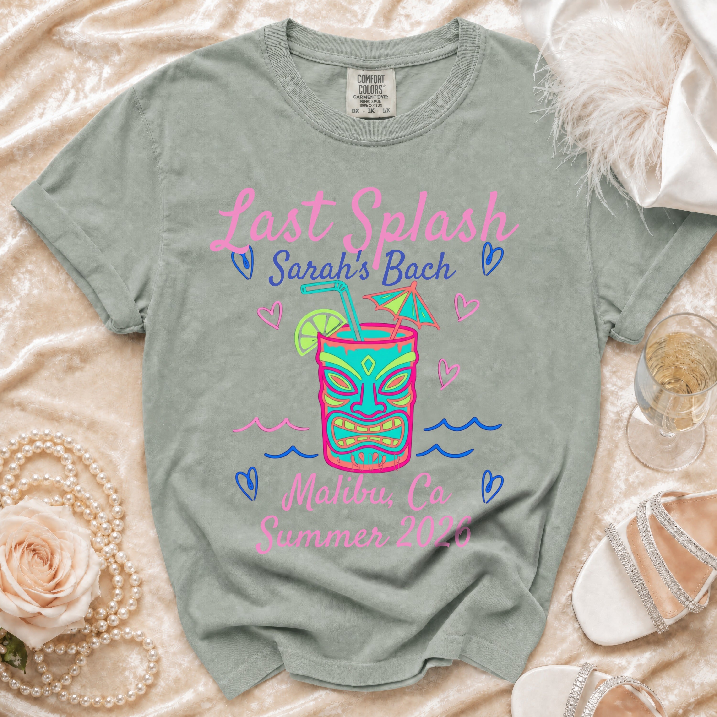 T-shirt with "Last Splash Sarah's Bach Malibu Ca Summer 2020" and tiki mask graphic.