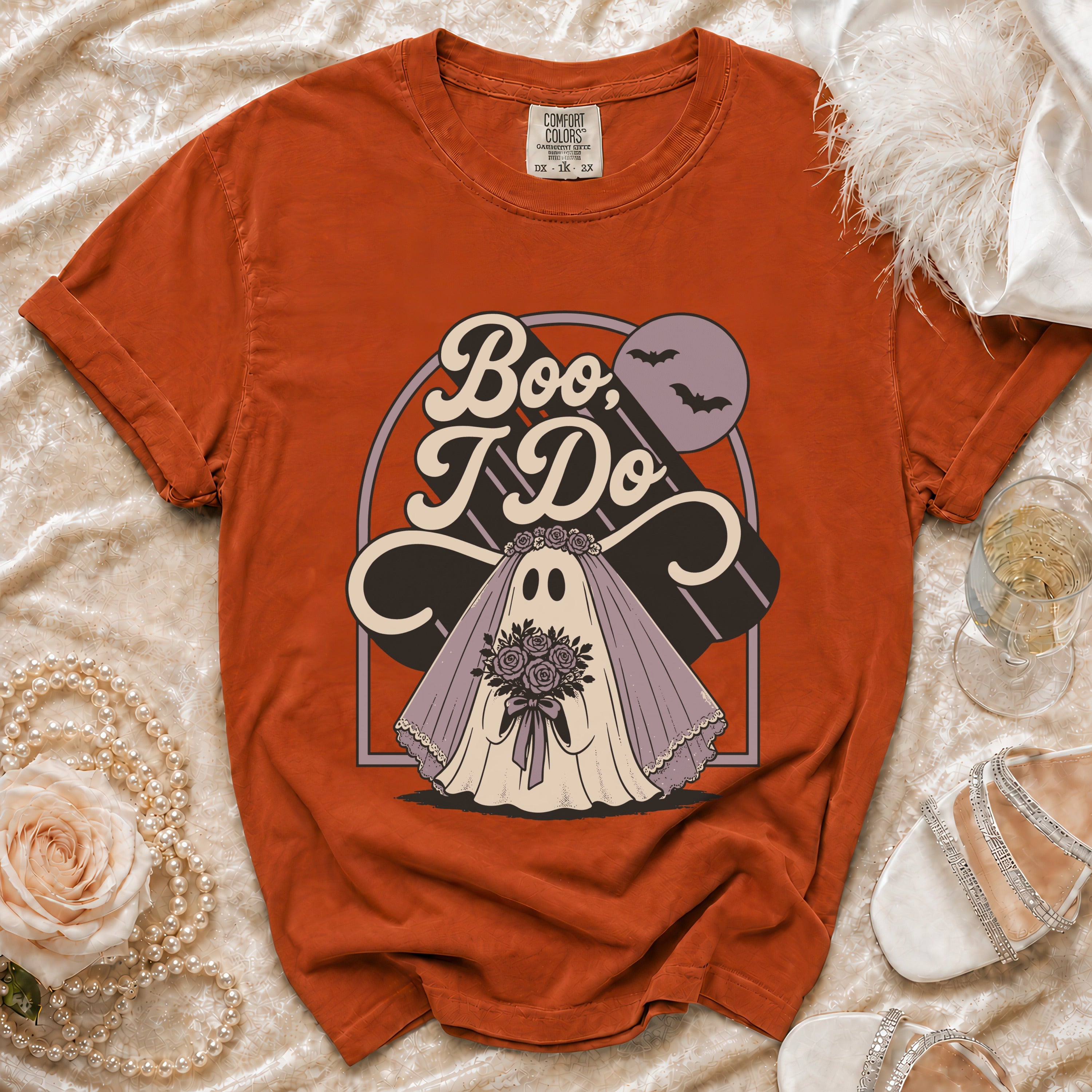 Orange Comfort Colors t-shirt with "Boo, I Do" ghost bride graphic.