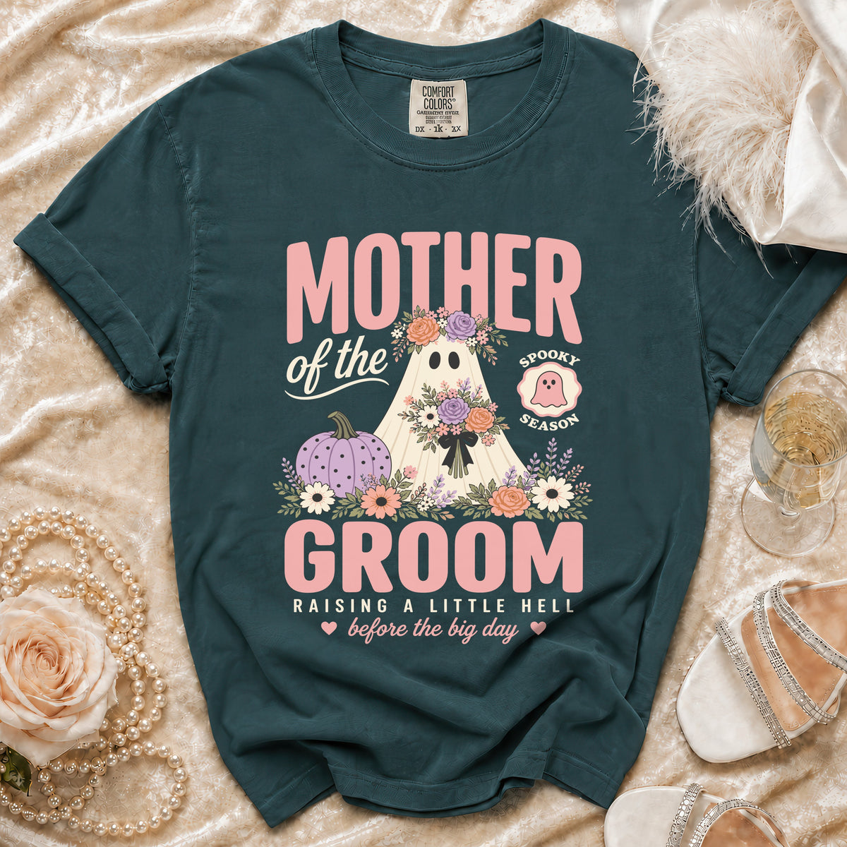 Dark green t-shirt with "Mother of the Groom" text, ghost, pumpkin, and flowers.