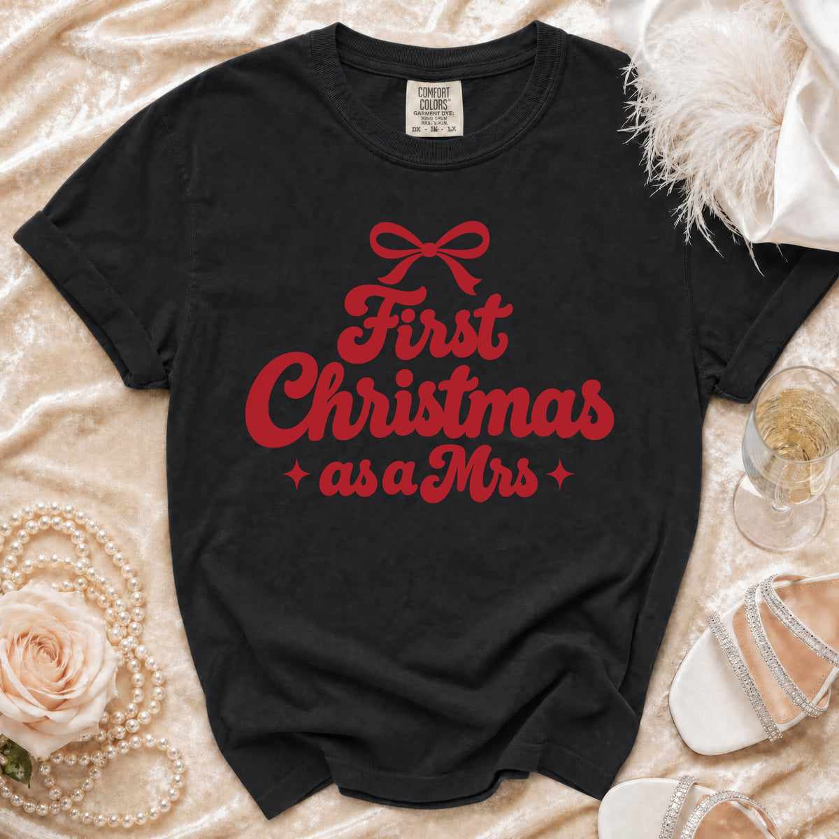 Black t-shirt with red "First Christmas as a Mrs" text and bow.