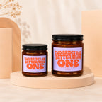 Two bridal candles with text "TWO BRIDES ARE BETTER THAN ONE LOVE WINS, ALWAYS VOWED".