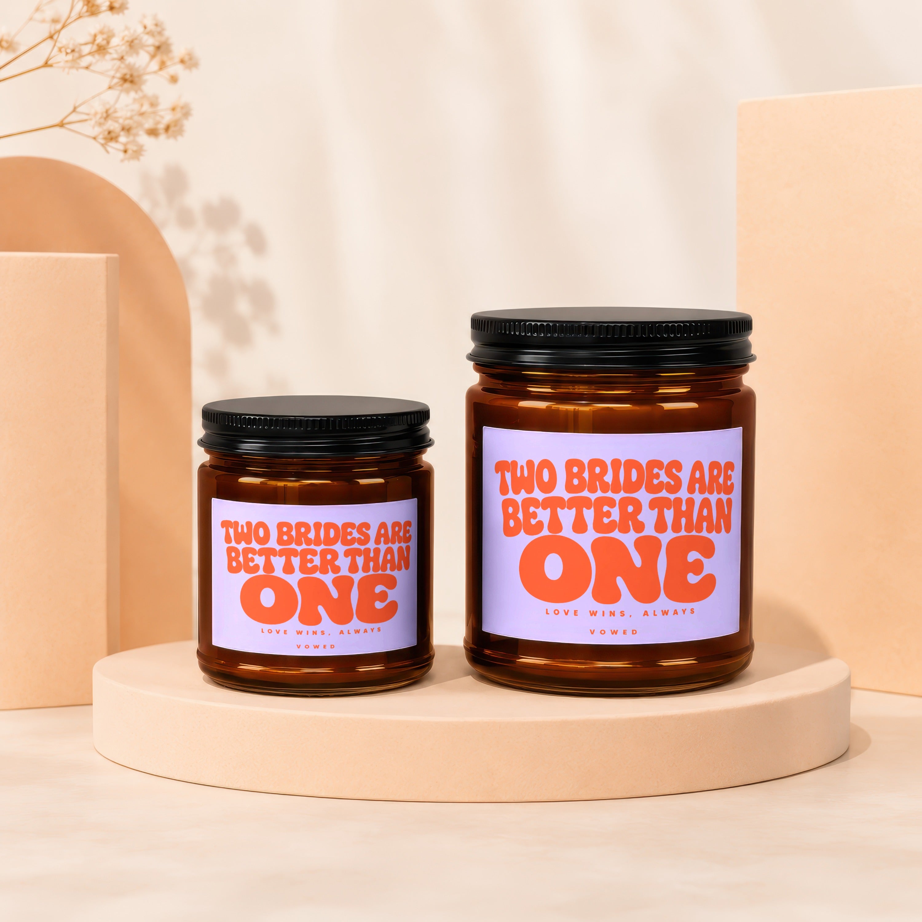 Two bridal candles with text "TWO BRIDES ARE BETTER THAN ONE LOVE WINS, ALWAYS VOWED".
