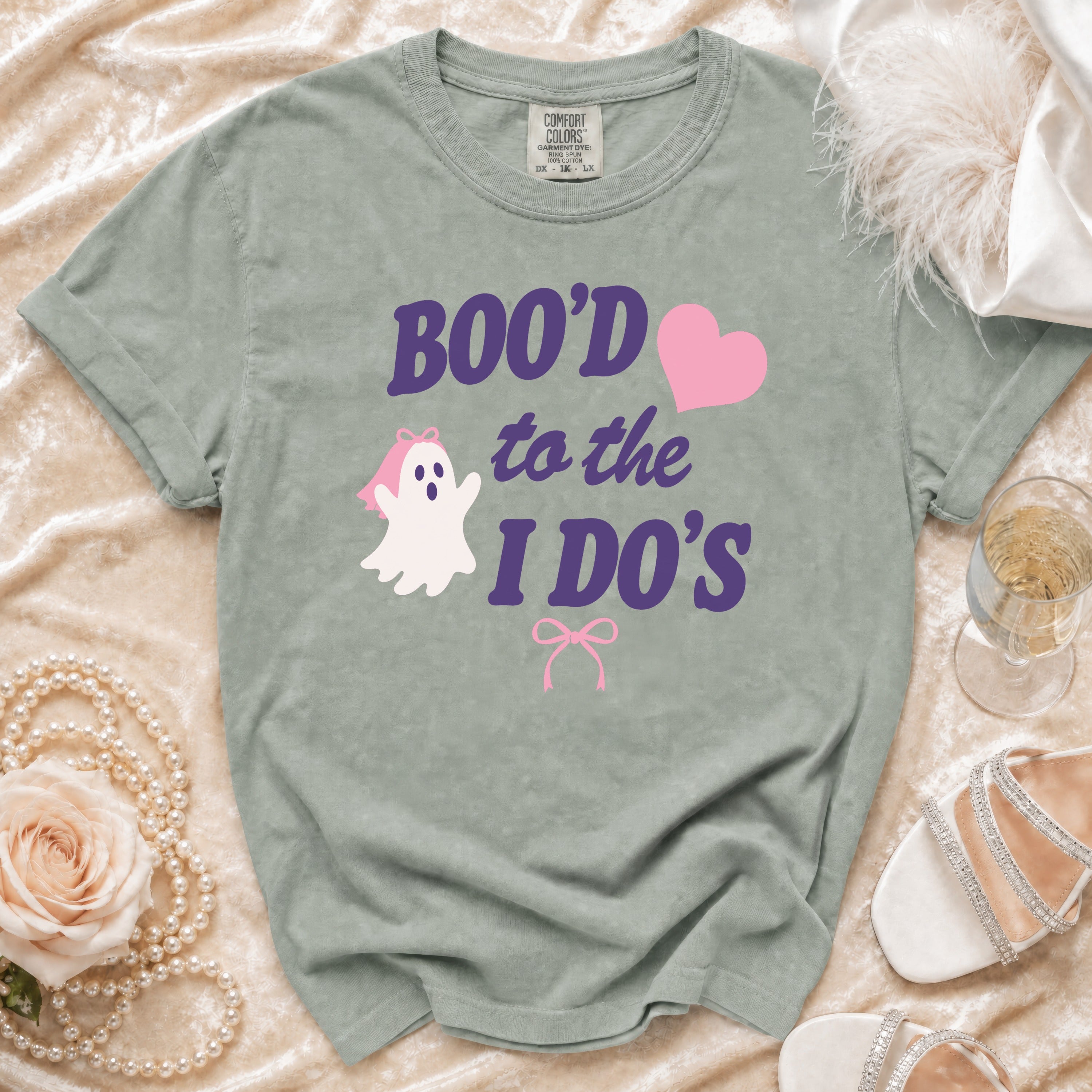 Ghost graphic t-shirt with "Boo'd to the I Do's" text and heart.