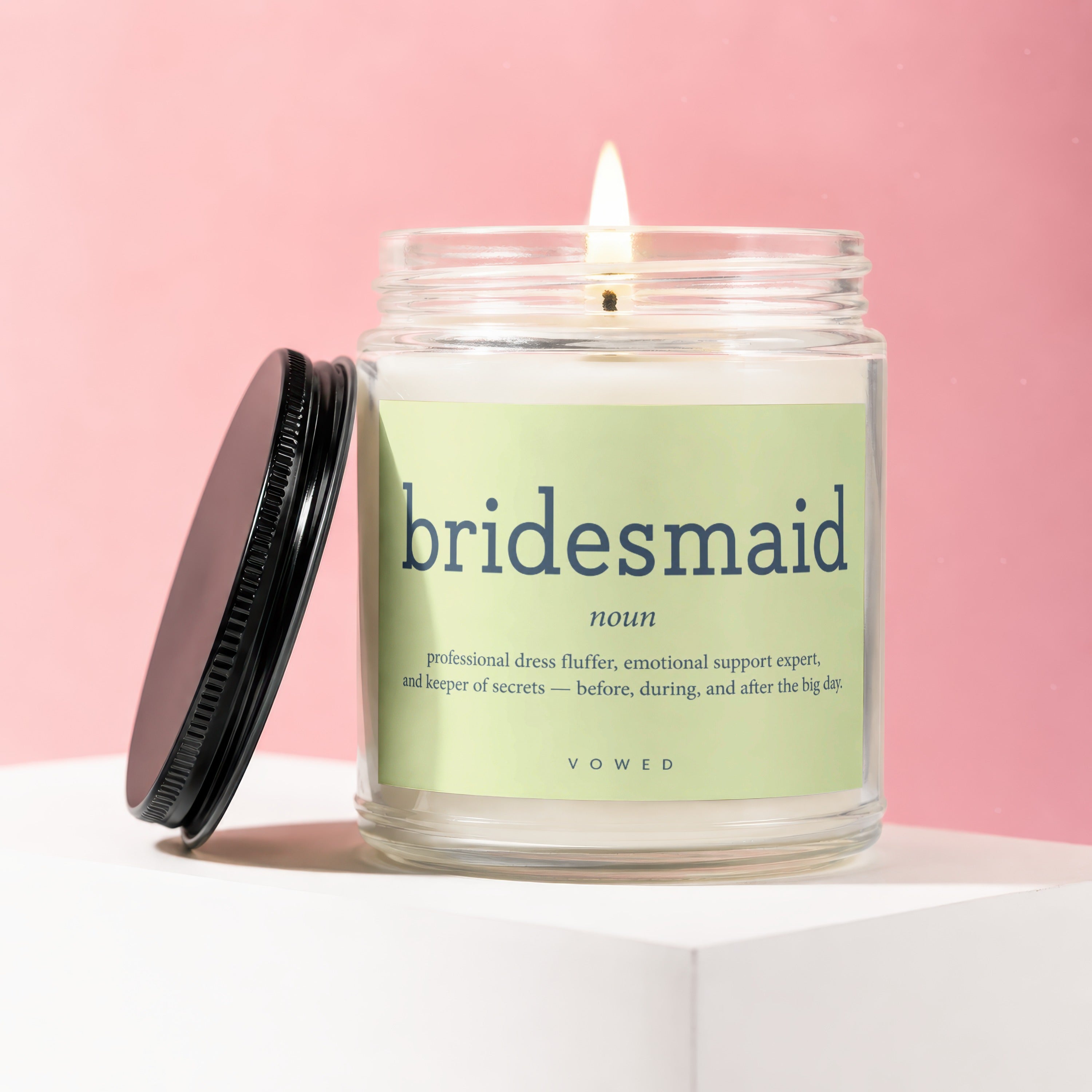 Candle with "bridesmaid" definition: professional dress fluffer, emotional support expert.