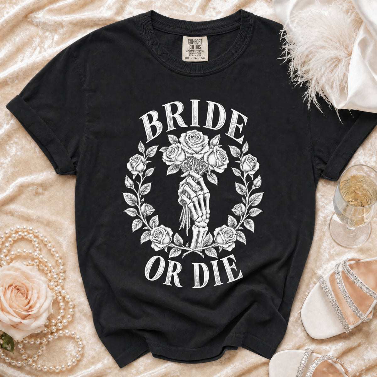 Black t-shirt with "BRIDE OR DIE" text and skeleton hand holding roses design.