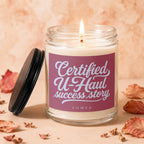 Lit candle in a jar with label "Certified U-Haul success story" and the word "vowed".