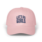 A light pink baseball cap with embroidered navy blue text reading "Let's Go Girls" across the front.